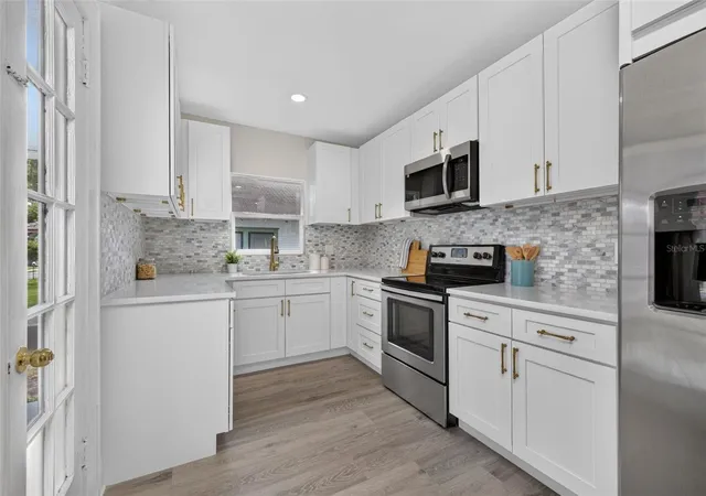 Photo 3 of Single family home for sale at 1201 Oakhill St, Lakeland, FL 33815 | MLS# O6427540 | Listing updated on 2026-09-12