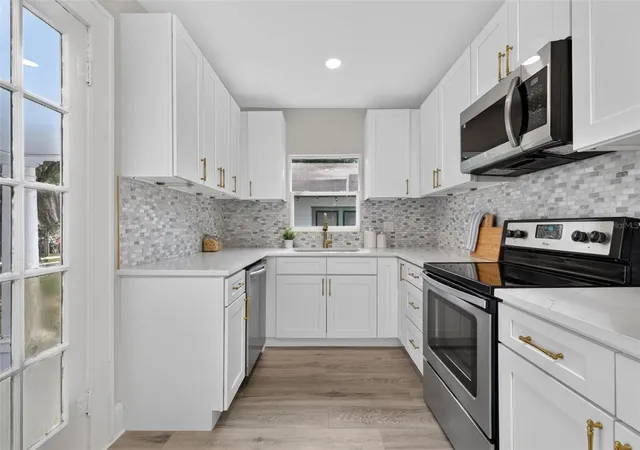 Photo 4 of Single family home for sale at 1201 Oakhill St, Lakeland, FL 33815 | MLS# O6427540 | Listing updated on 2026-09-12
