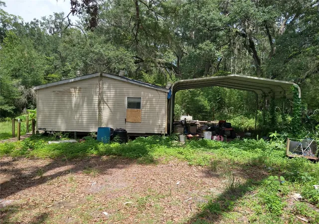Photo 2 of Manufactured home for sale at 10616 Shady Dr, Hudson, FL 34669 | MLS# W7887937 | Listing updated on 2026-09-10