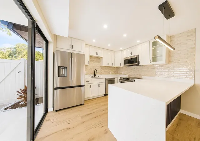Photo 3 of Townhouse for sale at 4030 Shannon Brown Dr, Orlando, FL 32808 | MLS# O6427730 | Listing updated on 2026-10-19