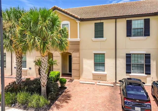 Photo 1 of Townhouse for sale at 8899 Geneve Ct, Kissimmee, FL 34747 | MLS# O6427755 | Listing updated on 2026-09-14
