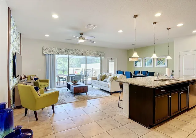 Photo 1 of Townhouse for sale at 8899 Geneve Ct, Kissimmee, FL 34747 | MLS# O6427755 | Listing updated on 2026-09-14