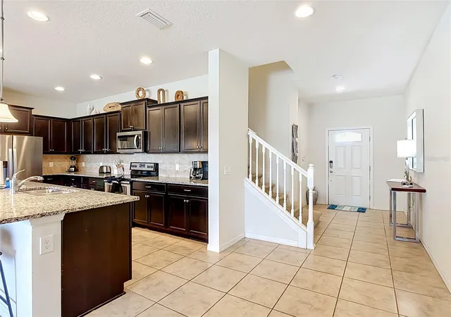 Photo 2 of Townhouse for sale at 8899 Geneve Ct, Kissimmee, FL 34747 | MLS# O6427755 | Listing updated on 2026-09-14