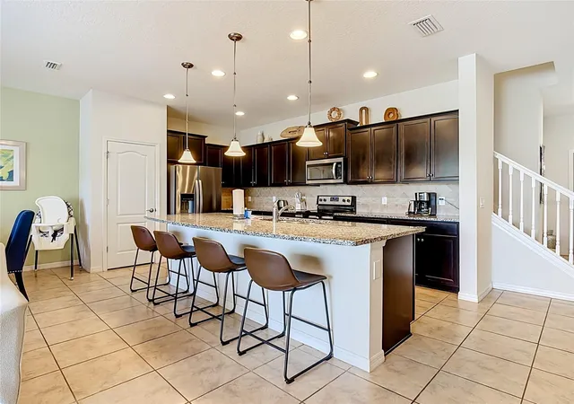 Photo 3 of Townhouse for sale at 8899 Geneve Ct, Kissimmee, FL 34747 | MLS# O6427755 | Listing updated on 2026-09-14