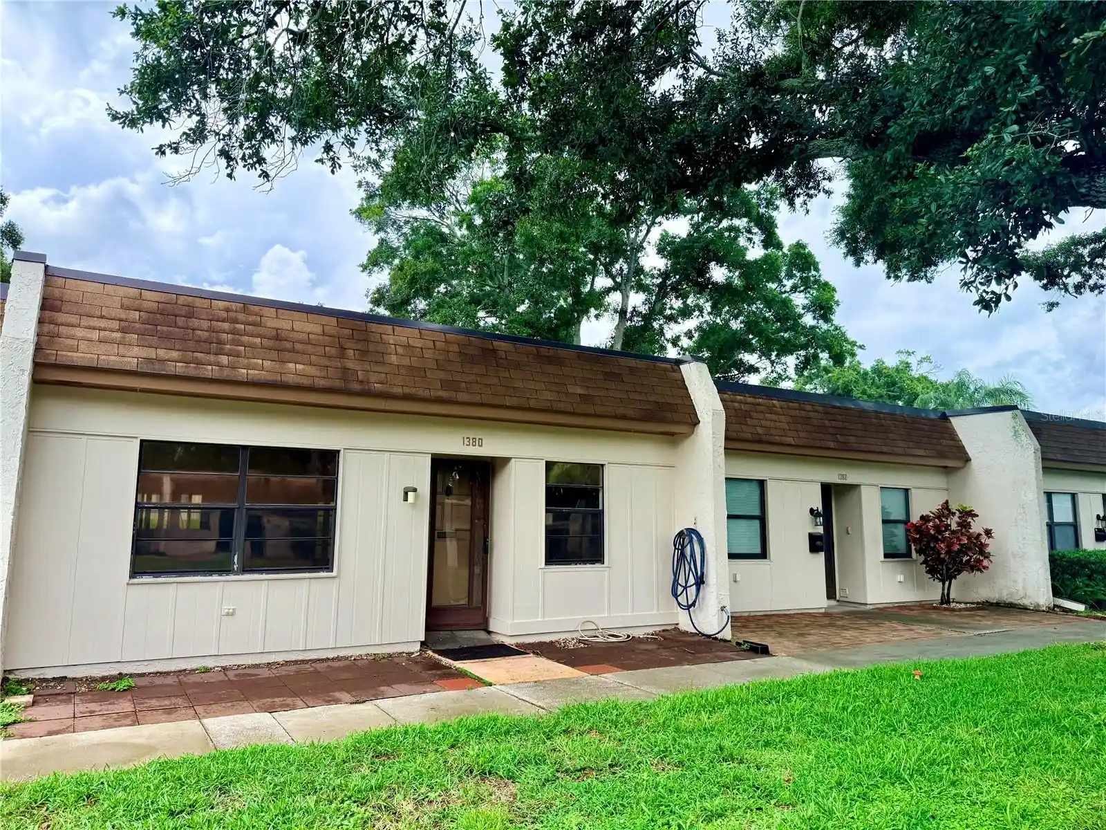 Listing Photo 1 - Condo for sale in 1380 Mission Cir located at 1380 Mission Cir, CLEARWATER, FL 33759 - Unit #44-C