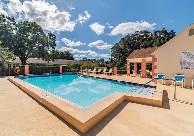 Photo 2 of Condo for sale at 11110 Carriage Hl Dr #5, Port Richey, FL 34668 | MLS# TB8532779 | Listing updated on 2026-09-25