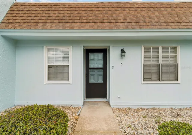 Photo 3 of Condo for sale at 11110 Carriage Hl Dr #5, Port Richey, FL 34668 | MLS# TB8532779 | Listing updated on 2026-09-25