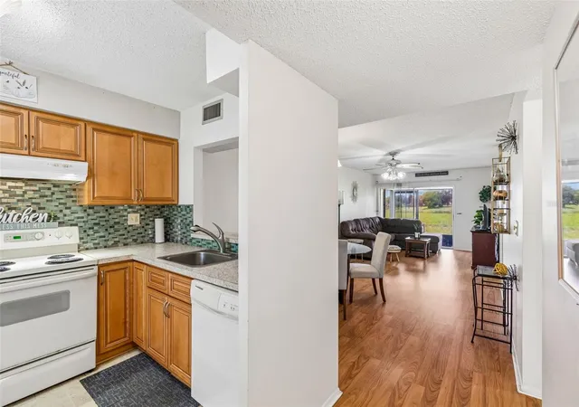 Photo 4 of Condo for sale at 11110 Carriage Hl Dr #5, Port Richey, FL 34668 | MLS# TB8532779 | Listing updated on 2026-09-25