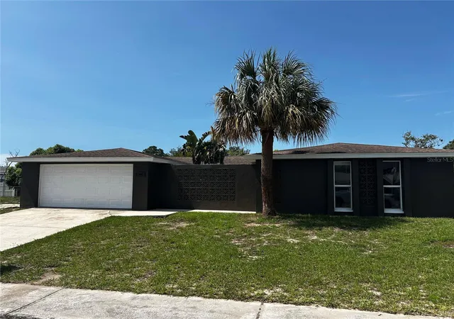 Photo 1 of Single family home for sale at 7335 Gulf Highlands Dr, Port Richey, FL 34668 | MLS# TB8532853 | Listing updated on 2026-09-14