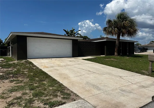 Photo 3 of Single family home for sale at 7335 Gulf Highlands Dr, Port Richey, FL 34668 | MLS# TB8532853 | Listing updated on 2026-09-14