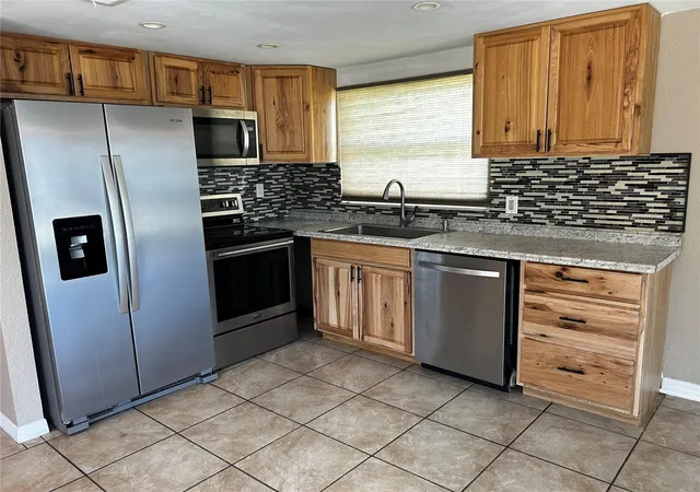 Photo 4 of Single family home for sale at 7335 Gulf Highlands Dr, Port Richey, FL 34668 | MLS# TB8532853 | Listing updated on 2026-09-14