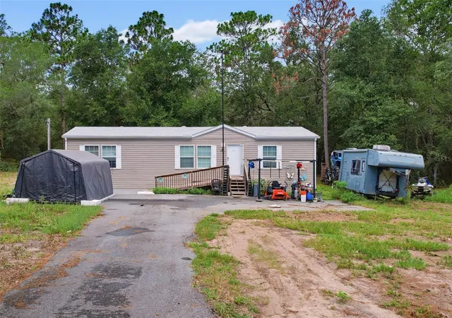 Photo 2 of Manufactured home for sale at 17721 Drayton St, Spring Hill, FL 34610 | MLS# W7888015 | Listing updated on 2026-09-14