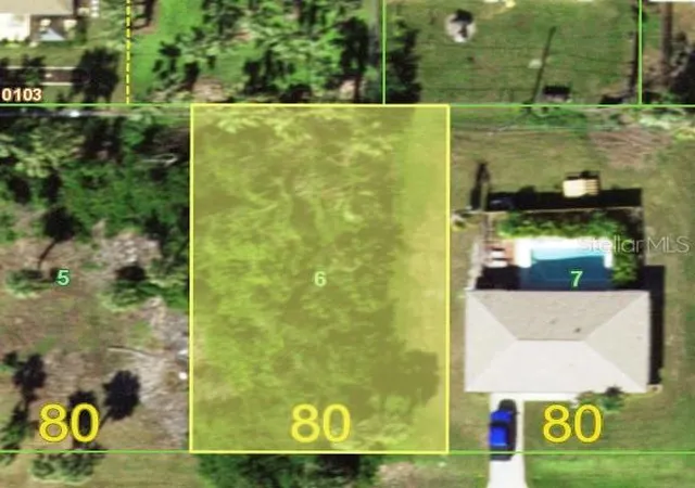 Photo 1 of Land for sale at 434 Garfield Ave Nw, Port Charlotte, FL 33952 | MLS# O6428533 | Listing updated on 2026-09-11