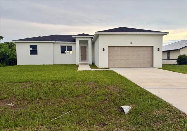 Photo 1 of Single family home for sale at 571 Mimosa Ave Nw, Port Charlotte, FL 33952 | MLS# O6428536 | Listing updated on 2026-10-02