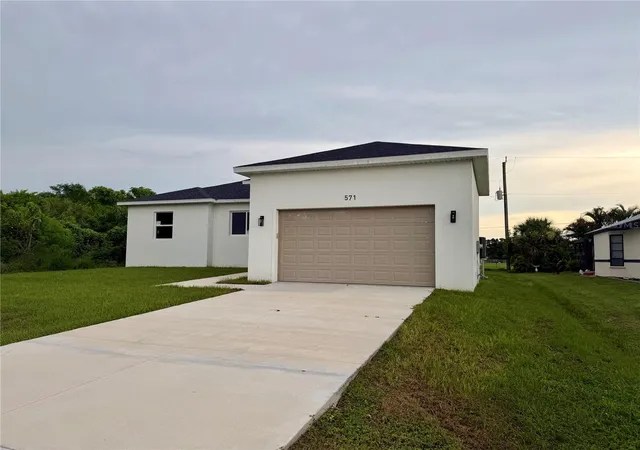 Photo 3 of Single family home for sale at 571 Mimosa Ave Nw, Port Charlotte, FL 33952 | MLS# O6428536 | Listing updated on 2026-10-02