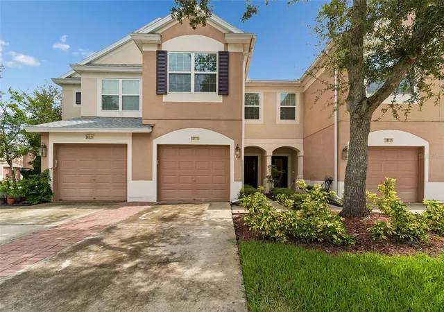 Photo 1 of Townhouse for sale at 26523 Chimney Spire Ln, Wesley Chapel, FL 33544 | MLS# TB8533599 | Listing updated on 2026-09-24