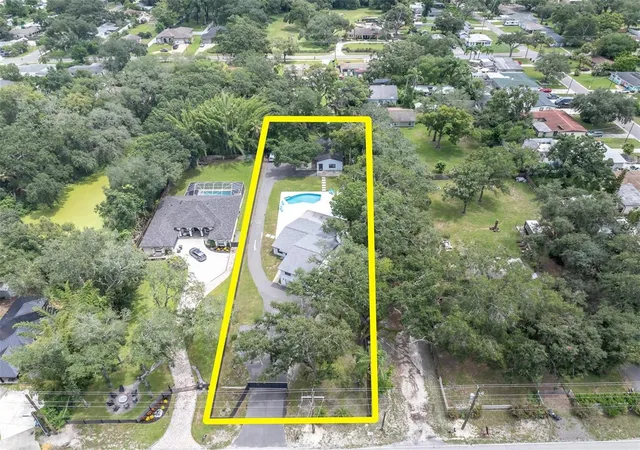 Photo 4 of Single family home for sale at 12409 N Boulevard, Tampa, FL 33612 | MLS# TB8533637 | Listing updated on 2026-09-22