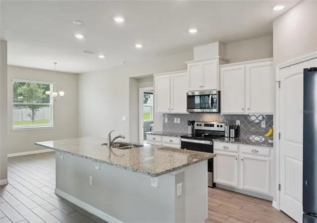 Photo 3 of Single family home for sale at 17954 Hither Hills Cir, Winter Garden, FL 34787 | MLS# O6429046 | Listing updated on 2026-09-10