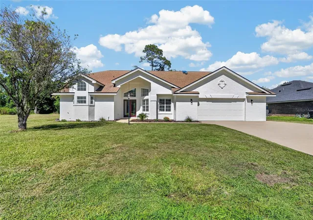 Photo 3 of Single family home for sale at 107 Lindsay Dr, Palm Coast, FL 32137 | MLS# FC320287 | Listing updated on 2026-10-16