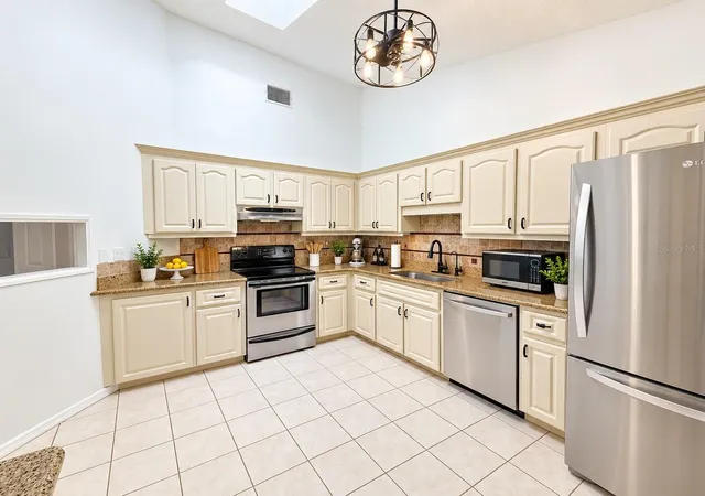Photo 3 of Single family home for sale at 77 Cimmaron Dr, Palm Coast, FL 32137 | MLS# FC320316 | Listing updated on 2026-10-04