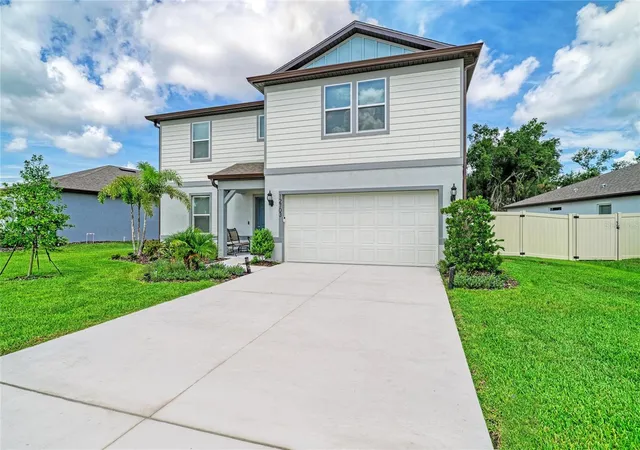 Photo 2 of Single family home for sale at 12703 Blue Reflection Ave, Parrish, FL 34219 | MLS# A4701559 | Listing updated on 2026-10-13