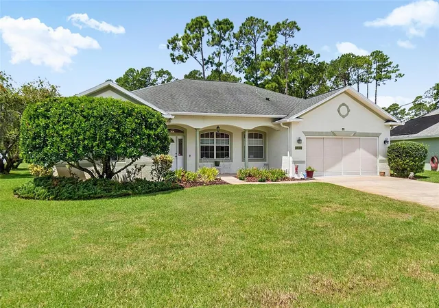 Photo 2 of Single family home for sale at 4 Ehrling Ln, Palm Coast, FL 32164 | MLS# FC320361 | Listing updated on 2026-09-25