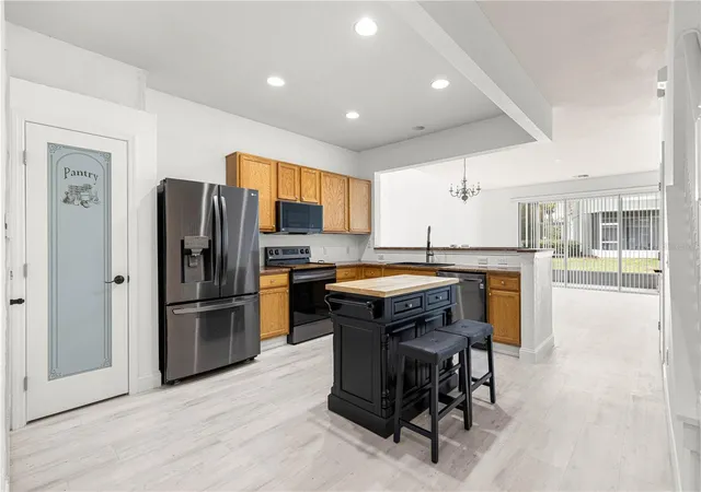 Photo 3 of Townhouse for sale at 4131 SW 51st Circle, Ocala, FL 34474 | MLS# OM729582 | Listing updated on 2026-09-15