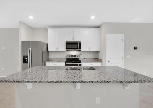 Photo 4 of Single family home for sale at 17403 Million Lakes Ct, Clermont, FL 34714 | MLS# O6430021 | Listing updated on 2026-10-22