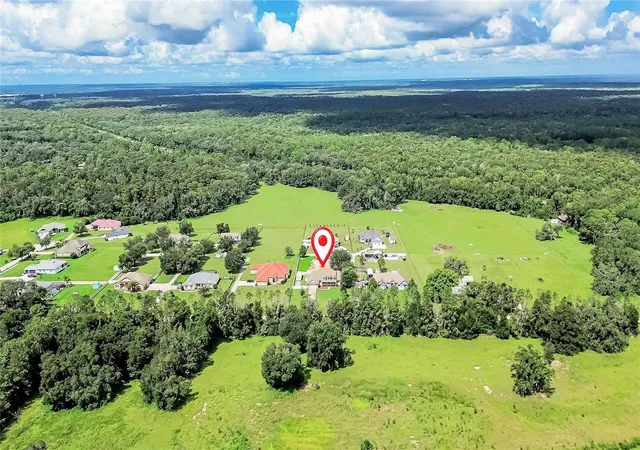 Photo 2 of Single family home for sale at 13975 Mcintosh Rd, Thonotosassa, FL 33592 | MLS# TB8535015 | Listing updated on 2026-10-03