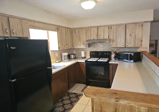 Photo 4 of Single family home for sale at 5203 SE 114th Street, Belleview, FL 34420 | MLS# OM729632 | Listing updated on 2026-09-14
