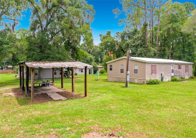 Photo 3 of Manufactured home for sale at 1021 NW 111th Court, Ocala, FL 34482 | MLS# OM729676 | Listing updated on 2026-09-12