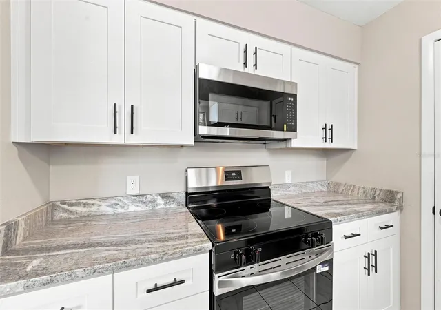 Photo 4 of Condo for sale at 4215 E Bay Dr #405, Clearwater, FL 33764 | MLS# TB8535412 | Listing updated on 2026-10-09