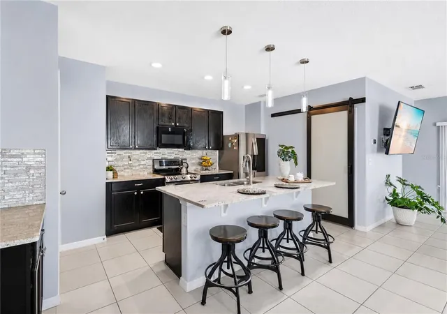 Photo 4 of Single family home for sale at 1795 Partin Ter Rd S, Kindred, FL 34744 | MLS# O6430319 | Listing updated on 2026-09-10