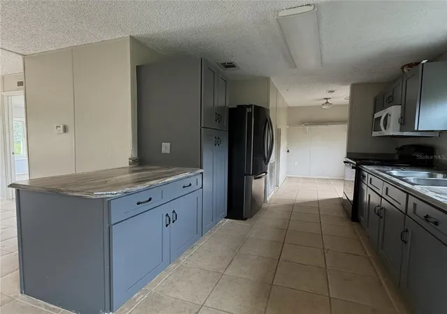 Photo 3 of Manufactured home for sale at 16036 Bosley Dr, Spring Hill, FL 34610 | MLS# W7888230 | Listing updated on 2026-09-14