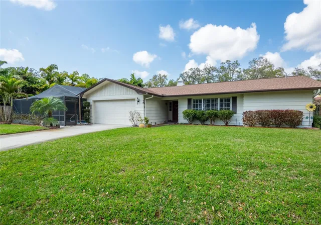 Photo 1 of Single family home for sale at 1830 Oak Forest Dr S, Clearwater, FL 33759 | MLS# TB8535583 | Listing updated on 2026-10-14