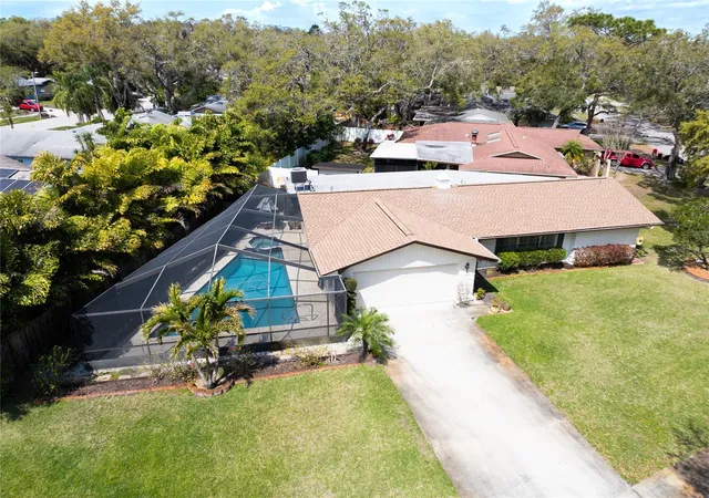 Photo 2 of Single family home for sale at 1830 Oak Forest Dr S, Clearwater, FL 33759 | MLS# TB8535583 | Listing updated on 2026-10-14