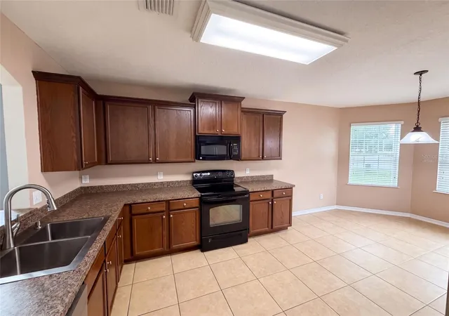 Photo 2 of Single family home for sale at 12902 Scout Ct, Grand Island, FL 32735 | MLS# O6430590 | Listing updated on 2026-09-14