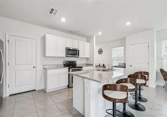 Photo 3 of Single family home for sale at 5667 Chorleywood Ln, Wesley Chapel, FL 33545 | MLS# TB8536141 | Listing updated on 2026-10-28