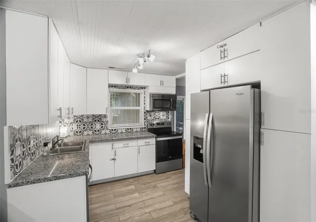 Photo 3 of Single family home for sale at 1663 San Mateo Dr, Dunedin, FL 34698 | MLS# TB8536200 | Listing updated on 2026-09-20