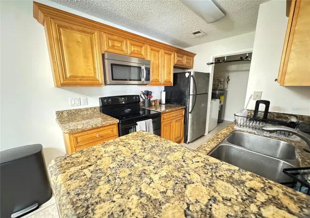 Photo 2 of Condo for sale at 2504 Grassy Point Dr #202, Lake Mary, FL 32746 | MLS# O6431341 | Listing updated on 2026-10-08