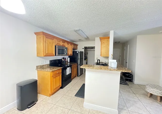 Listing Photo 5 - Condo for sale in building located at 2504 Grassy Pt Dr, Lake Mary, FL 32746 - Unit #202