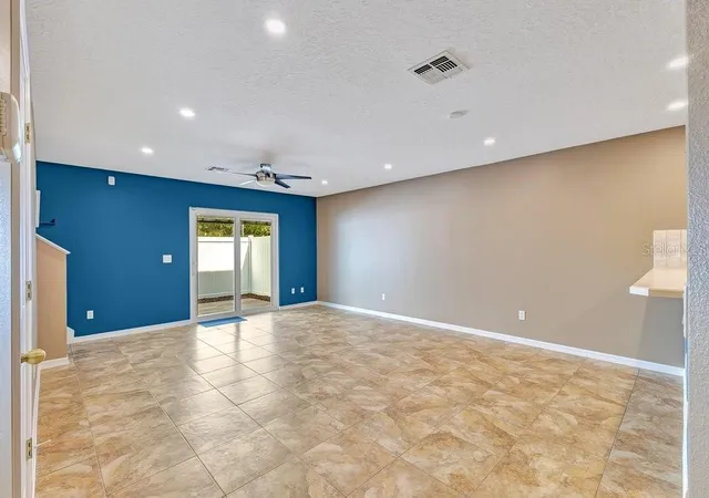 Photo 4 of Townhouse for sale at 942 Coquina Rock St, Orlando, FL 32828 | MLS# O6431483 | Listing updated on 2026-10-02