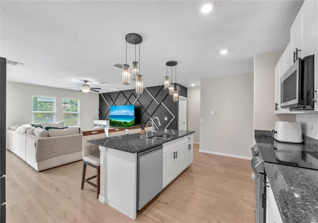 Photo 4 of Single family home for sale at 1911 Fan Aloe Way, Ruskin, FL 33570 | MLS# TB8536648 | Listing updated on 2026-09-15
