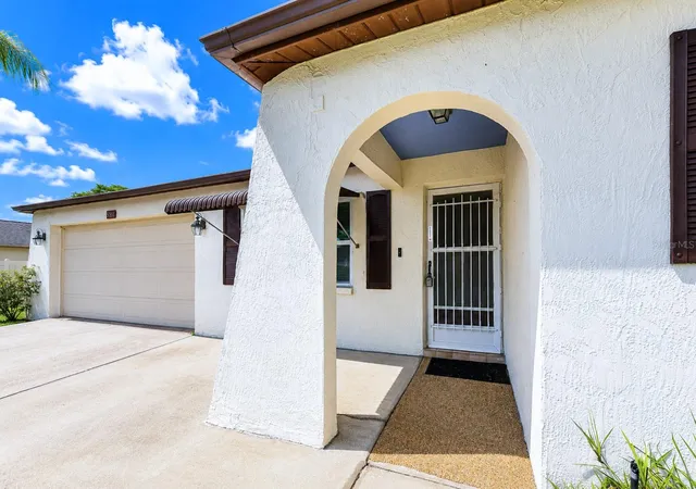 Photo 3 of Single family home for sale at 8811 Martinique Ln, Port Richey, FL 34668 | MLS# TB8536723 | Listing updated on 2026-10-07