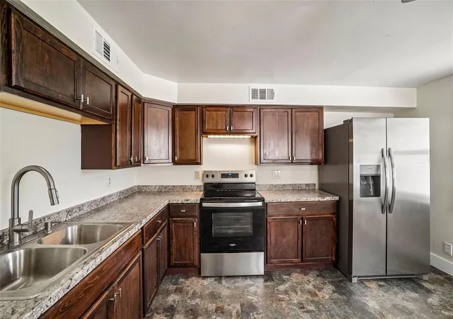 Photo 3 of Single family home for sale at 9216 W Robson St, Tampa, FL 33615 | MLS# TB8536894 | Listing updated on 2026-09-15