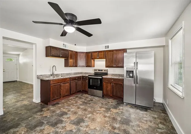 Photo 3 of Single family home for sale at 9216 W Robson St, Tampa, FL 33615 | MLS# TB8536894 | Listing updated on 2026-09-15