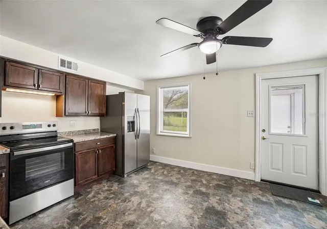 Photo 4 of Single family home for sale at 9216 W Robson St, Tampa, FL 33615 | MLS# TB8536894 | Listing updated on 2026-09-15