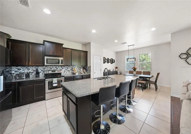 Photo 4 of Single family home for sale at 8415 Loblolly Pine Ct, Riverview, FL 33578 | MLS# TB8536901 | Listing updated on 2026-09-13