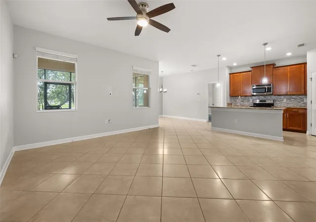 Photo 3 of Single family home for sale at 14157 Gold Brg Dr, Orlando, FL 32824 | MLS# S5155307 | Listing updated on 2026-09-12