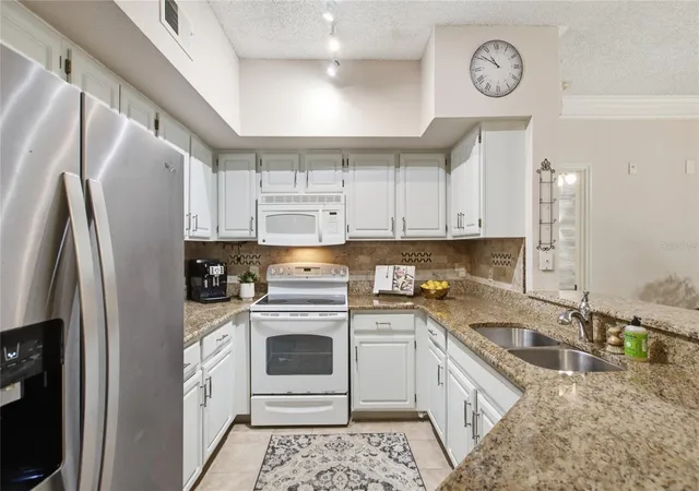 Listing Photo 4 - Condo for sale in building located at 13037 Mulberry Park Dr, Orlando, FL 32821 - Unit #518